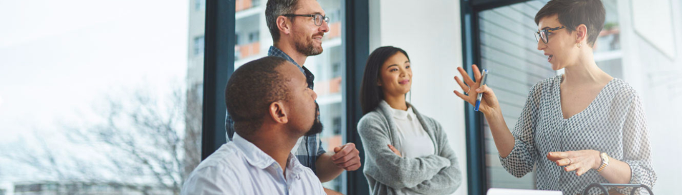 four people having a discussion